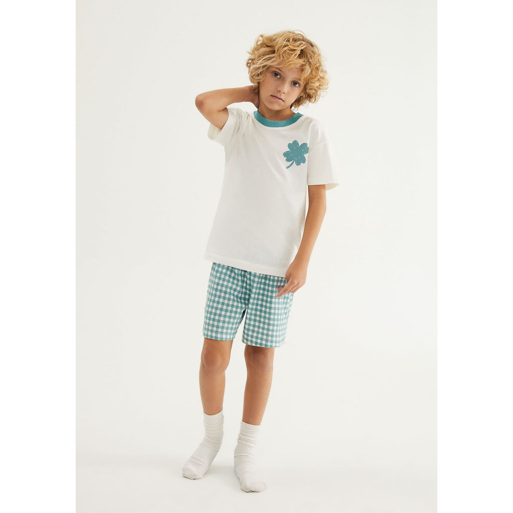Foto do produto apresentado no guia: Pijama curto infantil com saquinho: a troca da noite também vai na mala